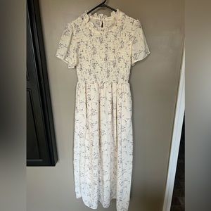 Roolee floral maxi dress with ruched bodice.